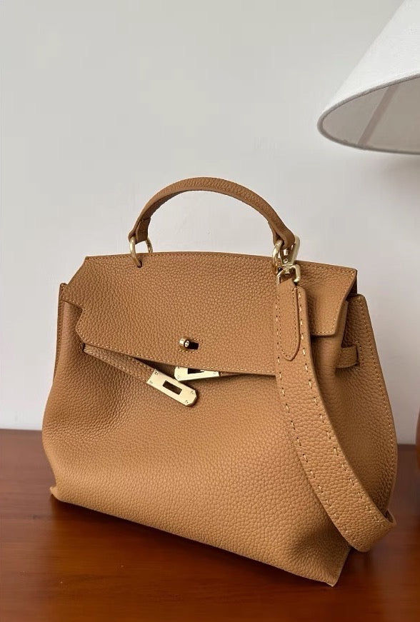 Tan leather satchel bag interior and pocket detail