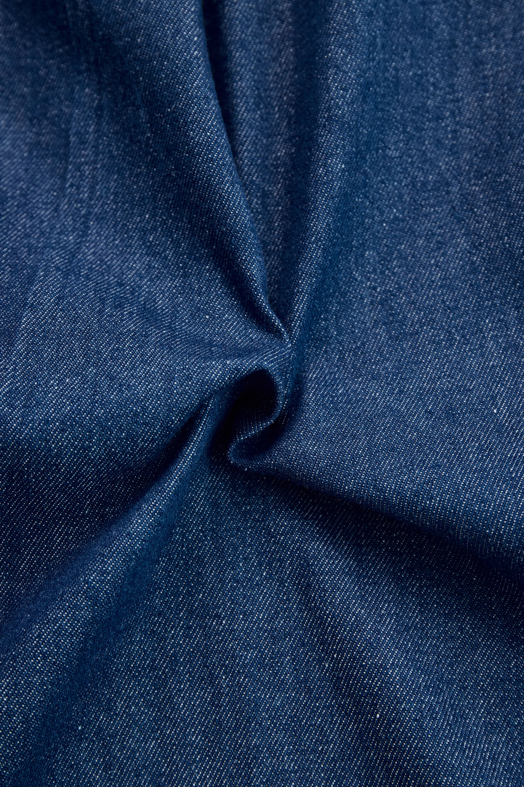 Dark blue denim fabric texture close-up