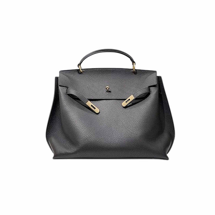 Leather satchel bag detail showing pebbled full-grain texture
