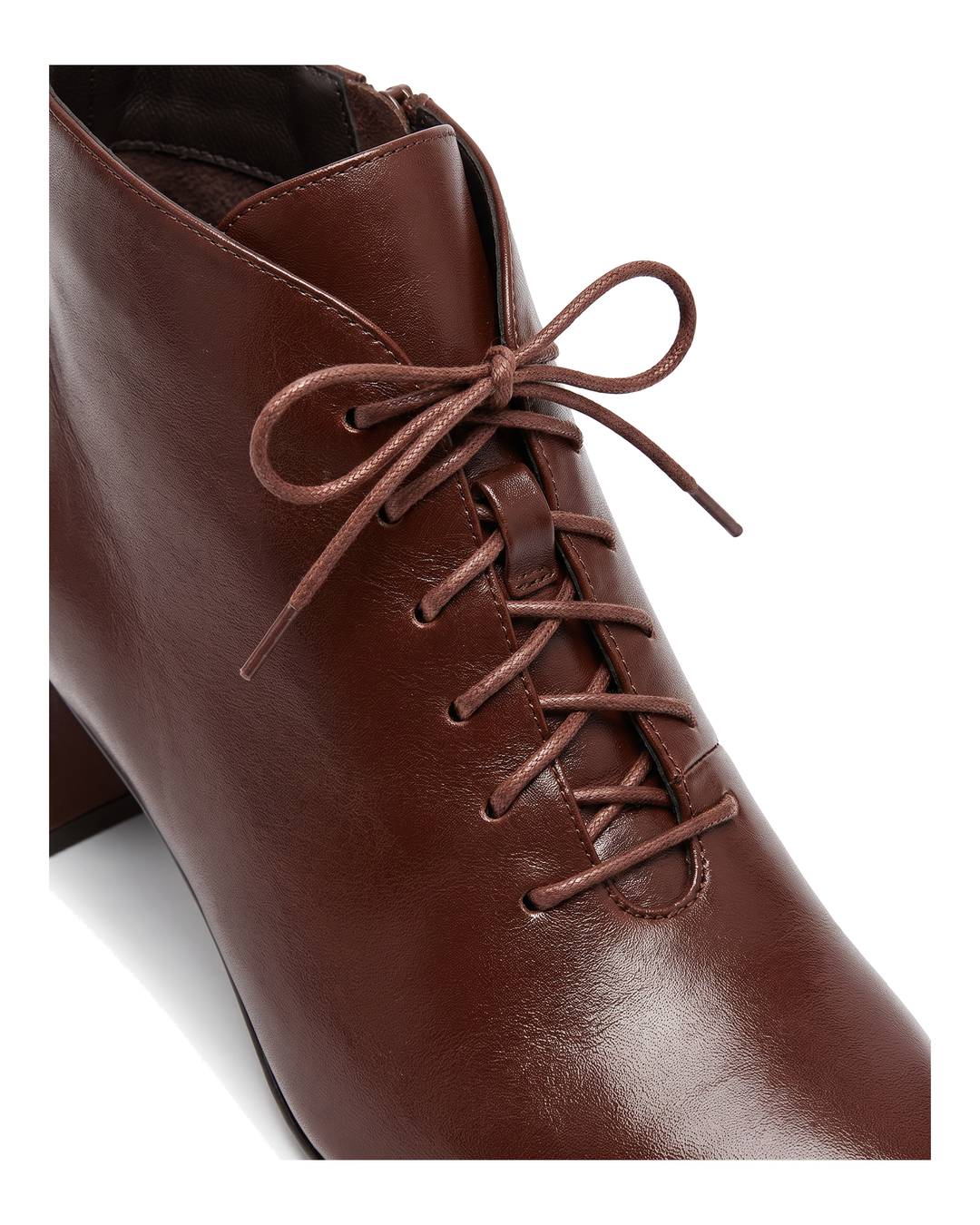 Close-up of the lace-up front and eyelets on Marguerite Women&