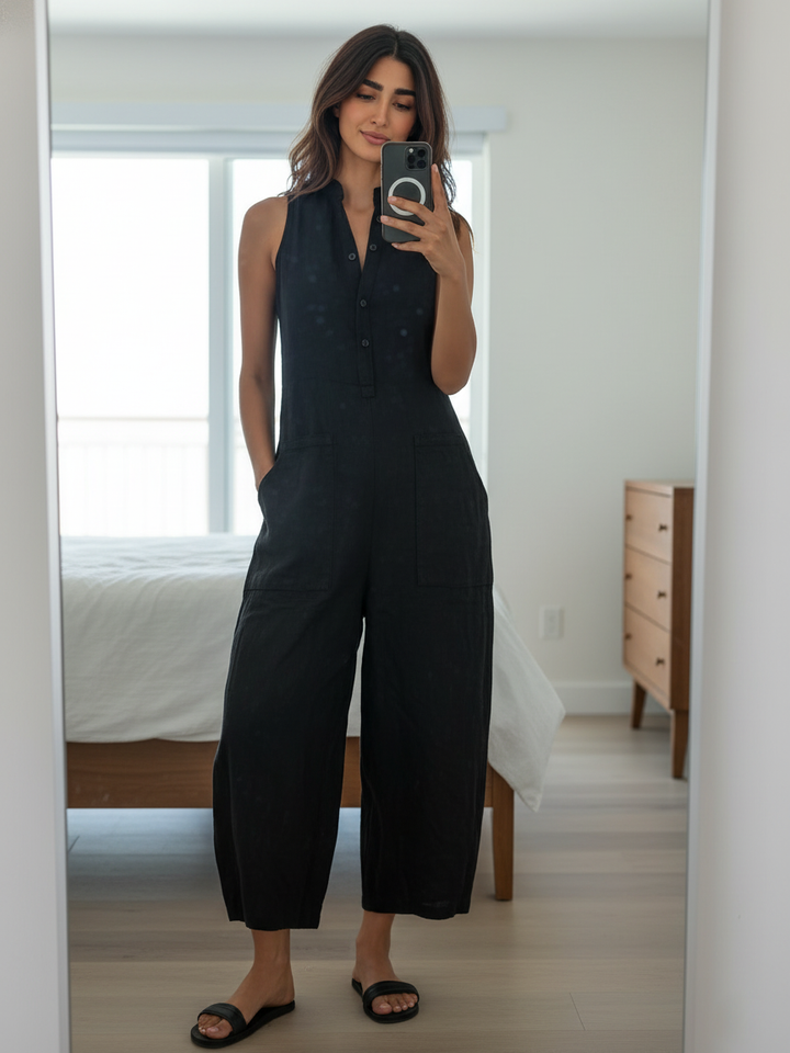 Colette linen-blend jumpsuit in black, worn everyday styling