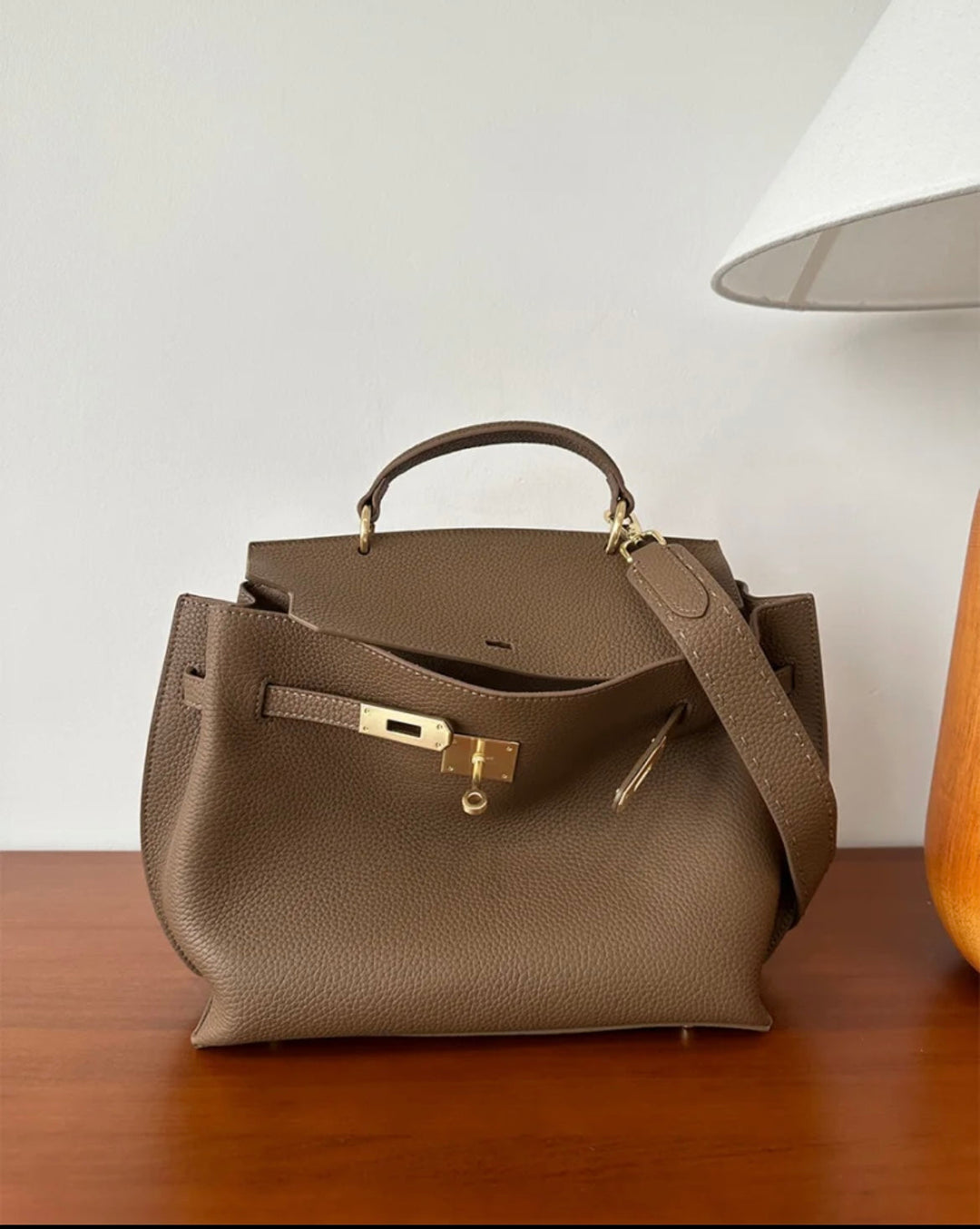 Structured top-handle leather satchel bag in taupe, front view