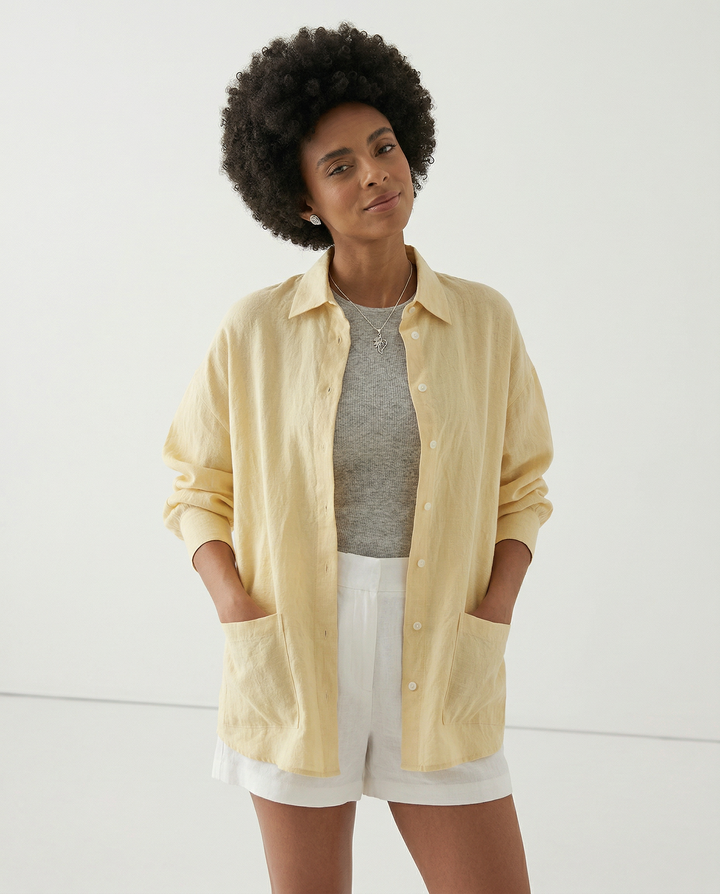 White slit hem linen button-down shirt for summer capsule wardrobe