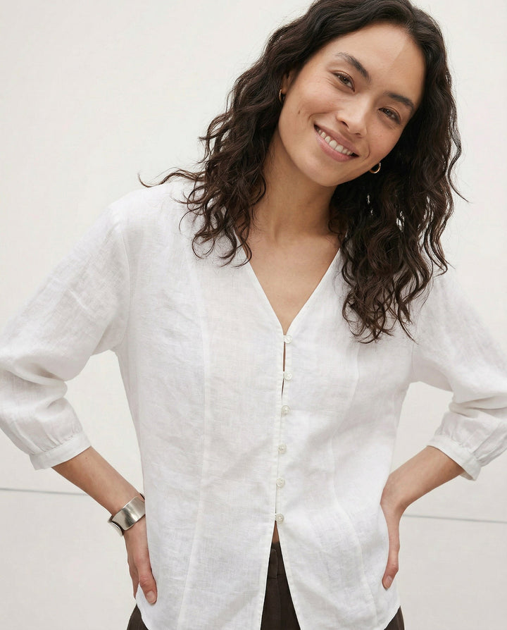 White fitted V-neck linen blouse for summer office and work outfit