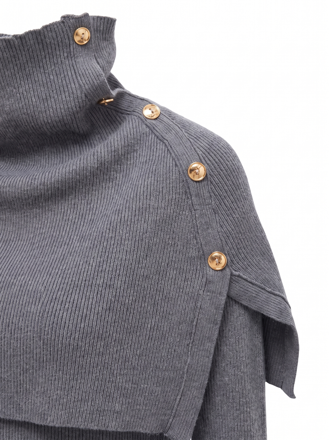 Close-up of the gold buttons on the shoulder
