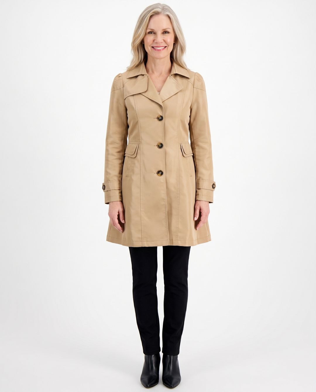 Woman wearing the Clementine fitted mid-length trench coat in khaki
