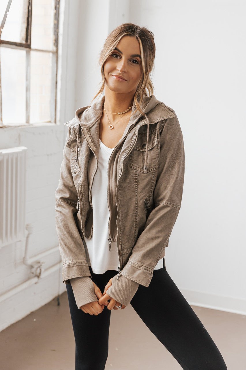 Grey moto jacket with drawstring hood, side view