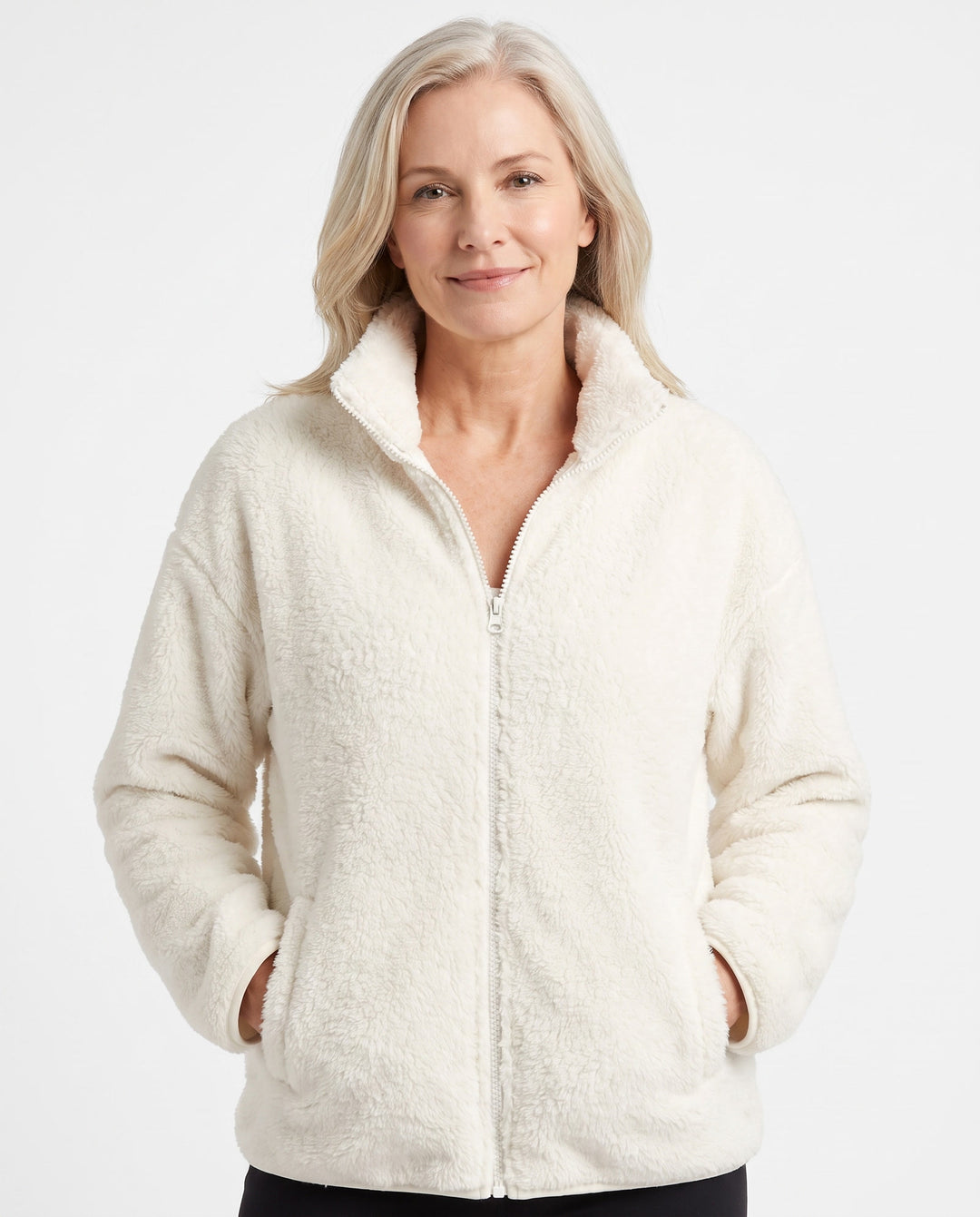 Woman wearing the Vera cream fleece jacket, front view