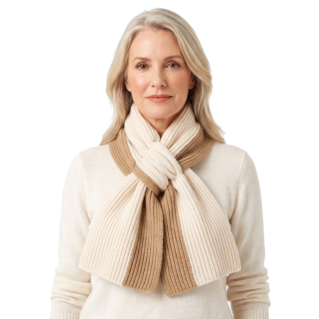 Woman wearing the Eleanor-Leonora ribbed knit pull-through scarf in cream and camel