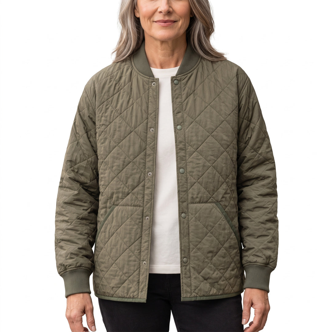 Woman wearing the Sybil-Camilla military green quilted snap-front jacket
