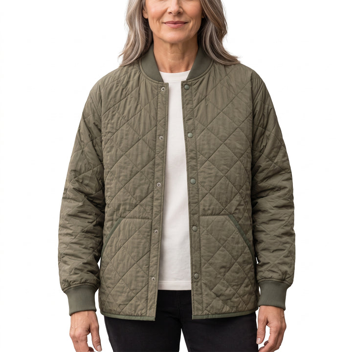 Woman wearing the Sybil-Camilla military green quilted snap-front jacket