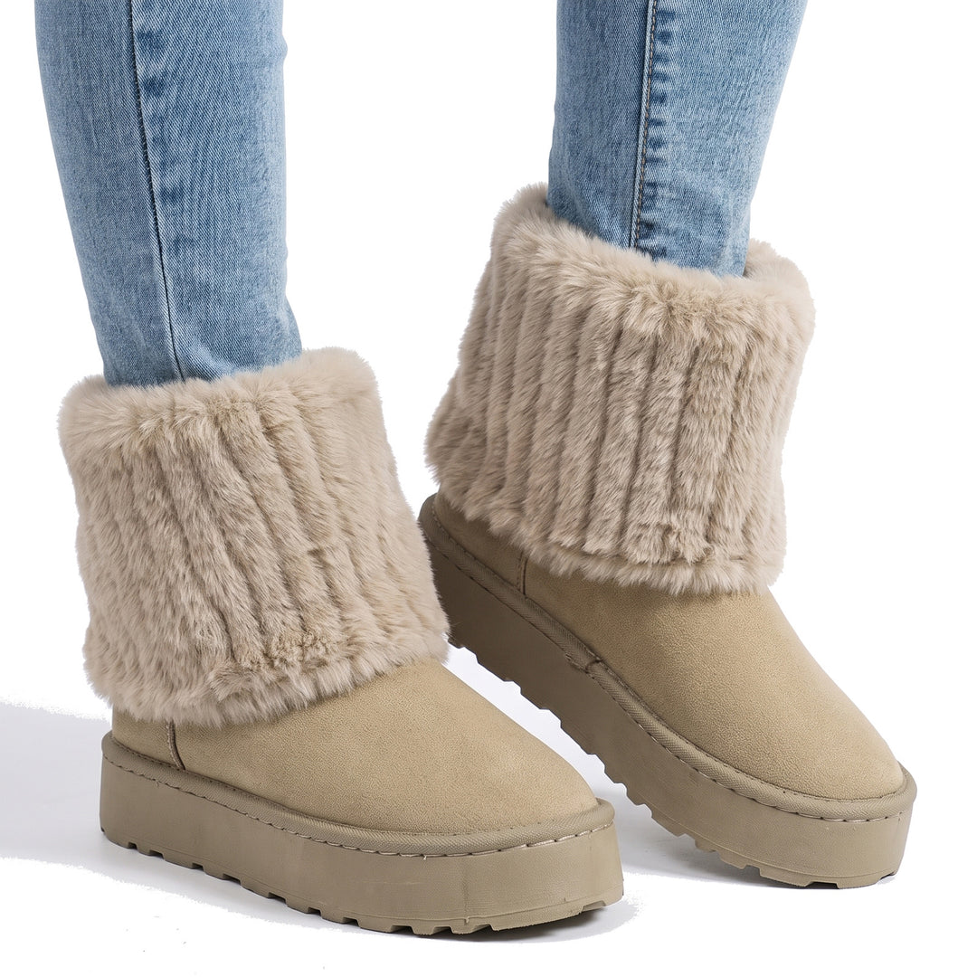 Women's cozy off-white faux-suede platform ankle boots with plush faux-fur cuff, worn with jeans
