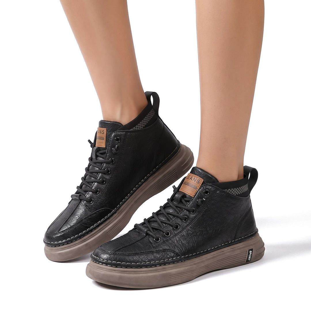 Colette-Annelise women's black high-top lace-up trainers worn with taupe gum sole