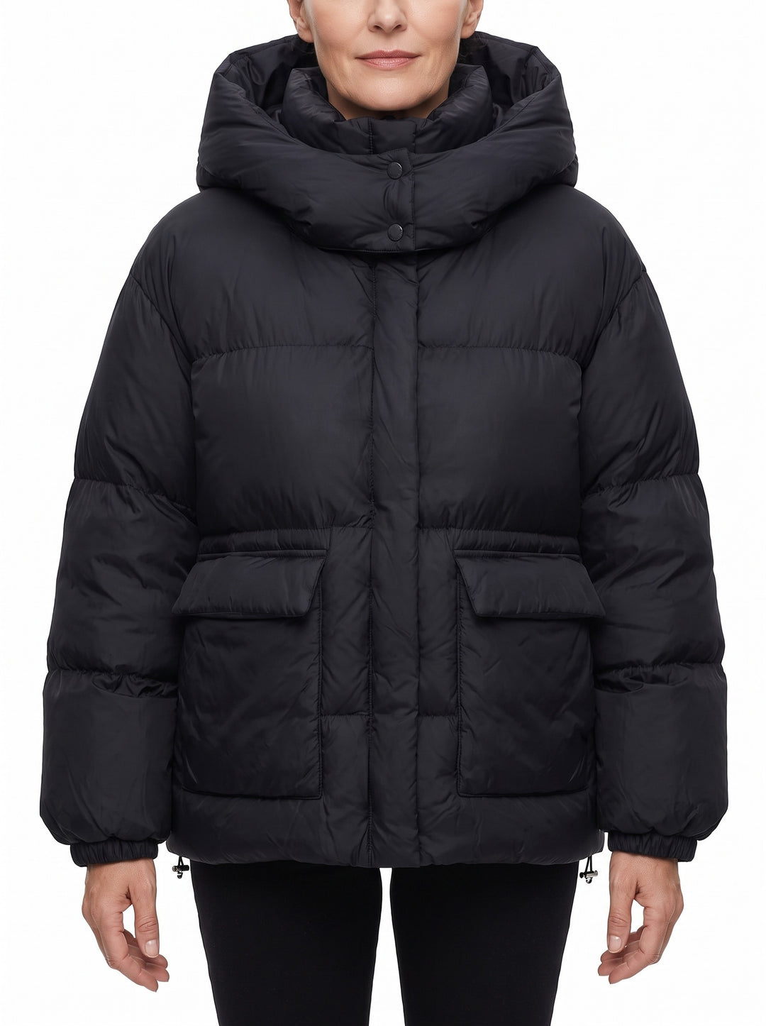 Woman wearing the black oversized hooded puffer jacket