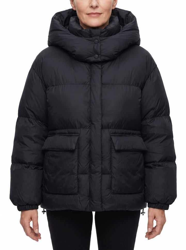 Woman wearing the black oversized hooded puffer jacket